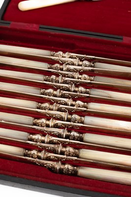Lot 402 - A set of eighteen French mother-of-pearl handled knives