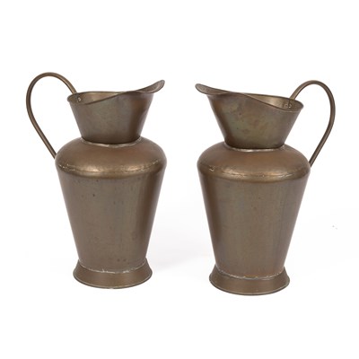 Lot 375 - A pair of over sized brass jugs