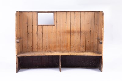 Lot 887 - A George III pine high-back settle