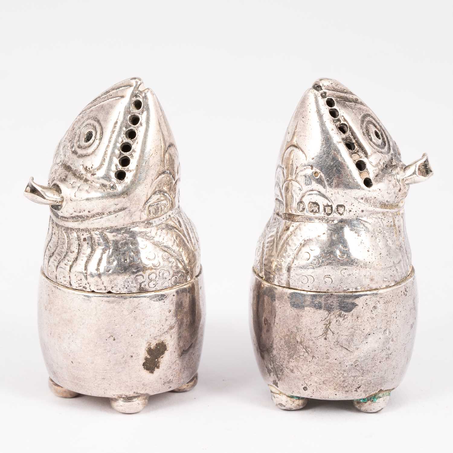 Lot 25 - A pair of Victorian novelty silver pepper pots