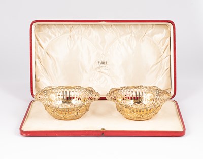 Lot 28 - A pair of Edwardian silver-gilt baskets