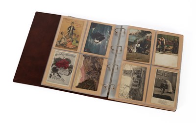 Lot 994 - An album of over 150 early 20th Century postcards