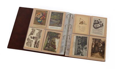 Lot 994 - An album of over 150 early 20th Century postcards