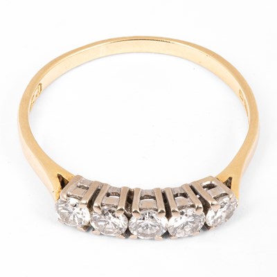 Lot 151 - An 18ct yellow gold and diamond five-stone ring