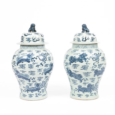 Lot 247 - A pair of Chinese porcelain blue and white jars and covers