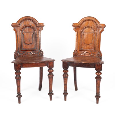 Lot 300 - A pair of Victorian oak hall chairs