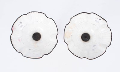 Lot 107 - A pair of Bilston enamel candlesticks