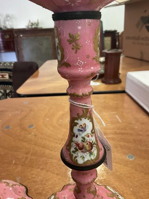 Lot 107 - A pair of Bilston enamel candlesticks