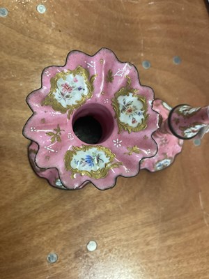 Lot 107 - A pair of Bilston enamel candlesticks