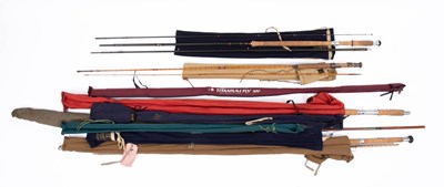 Lot 907 - A collection of nine fishing rods