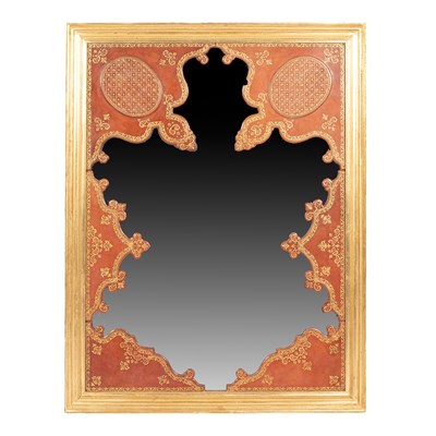 Lot 361 - A Continental tooled leather panelled wall mirror