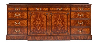 Lot 363 - A mahogany and flame mahogany breakfront sideboard by Theodore Alexander