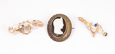 Lot 210 - Three Victorian/Edwardian yellow metal brooches