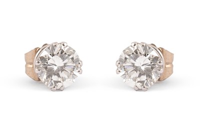 Lot 211 - An impressive pair of diamond single stone stud earrings