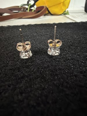 Lot 211 - An impressive pair of diamond single stone stud earrings