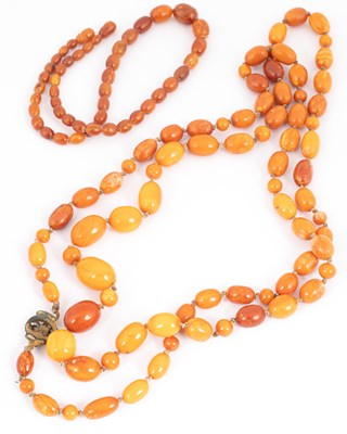 Lot 213 - Two amber necklaces