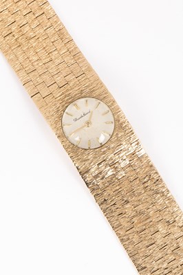 Lot 231 - A lady's 9ct yellow gold Bueche Girod bracelet wristwatch