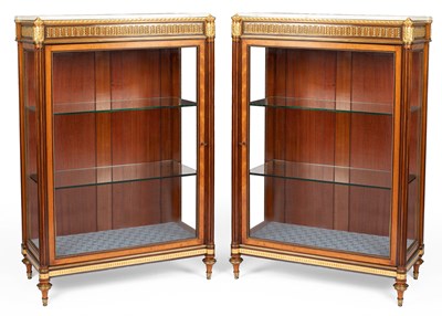 Lot 369 - A pair of Louis XVI style ormolu mounted bois satine and amaranth display cabinets