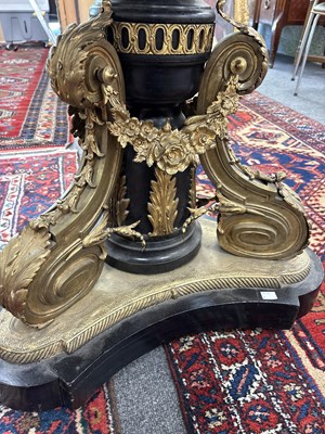 Lot 367 - A Sèvres style porcelain and brass mounted centre table
