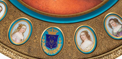 Lot 367 - A Sèvres style porcelain and brass mounted centre table