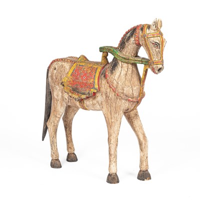 Lot 680 - An Indian carved and painted figure of a horse
