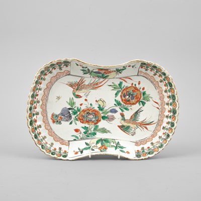 Lot 298 - A set of three rare Chinese famille verte moulded rounded-oblong dishes