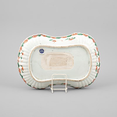 Lot 298 - A set of three rare Chinese famille verte moulded rounded-oblong dishes