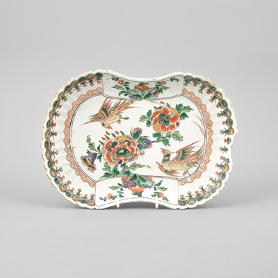 Lot 298 - A set of three rare Chinese famille verte moulded rounded-oblong dishes