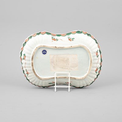 Lot 298 - A set of three rare Chinese famille verte moulded rounded-oblong dishes