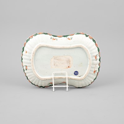Lot 298 - A set of three rare Chinese famille verte moulded rounded-oblong dishes