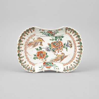 Lot 298 - A set of three rare Chinese famille verte moulded rounded-oblong dishes