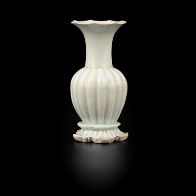 Lot A small Qingbai fluted baluster vase