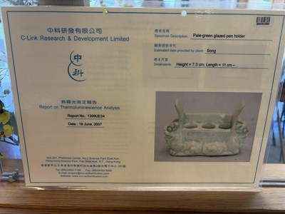 Lot 303 - A small Qingbai porcelain animal form brush holder