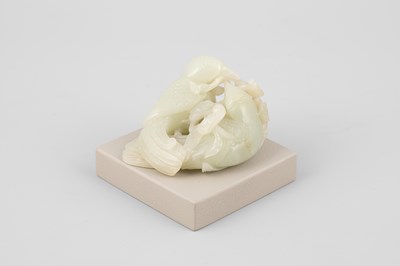 Lot 307 - A pale celadon jade bird group
