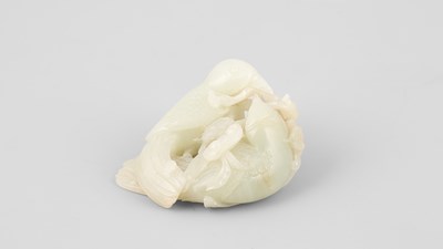 Lot 307 - A pale celadon jade bird group