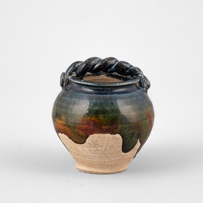 Lot 310 - A small sancai pottery jarlet