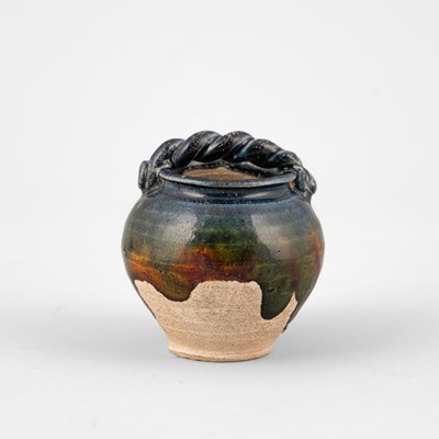 Lot 310 - A small sancai pottery jarlet
