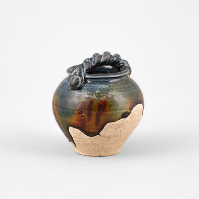Lot 310 - A small sancai pottery jarlet