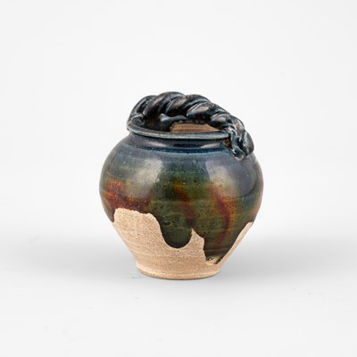 Lot 310 - A small sancai pottery jarlet