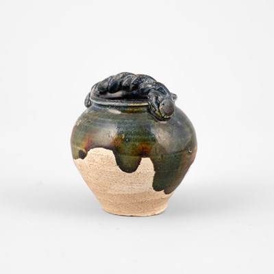 Lot 310 - A small sancai pottery jarlet