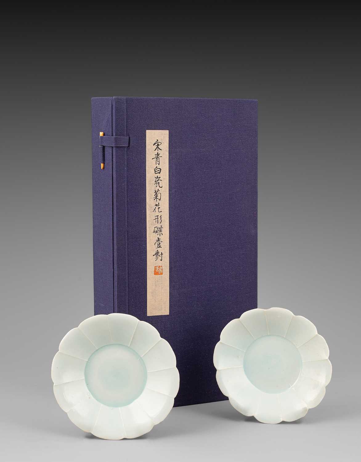 Lot 311 - A pair of small Qingbai foliate dishes