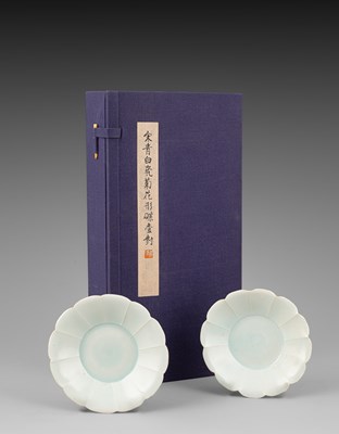 Lot 311 - A pair of small Qingbai foliate dishes