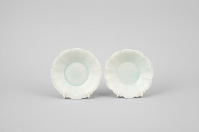 Lot 311 - A pair of small Qingbai foliate dishes