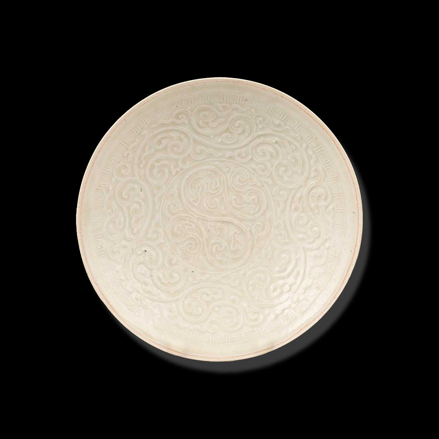 Lot 313 - A Qingbai moulded floral saucer dish