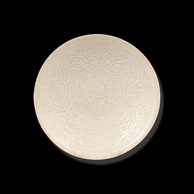 Lot 313 - A Qingbai moulded floral saucer dish