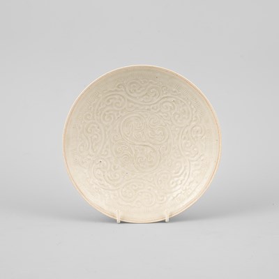 Lot 313 - A Qingbai moulded floral saucer dish