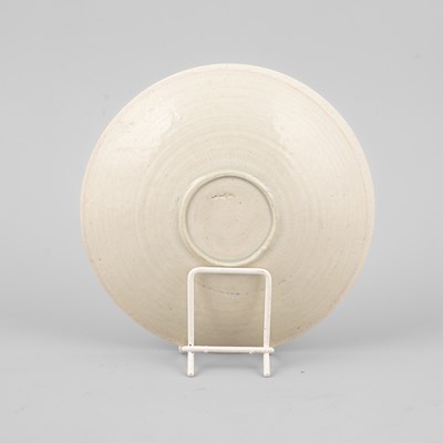 Lot 313 - A Qingbai moulded floral saucer dish