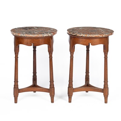 Lot 307 - A pair of Gillows marble-topped oak occasional tables