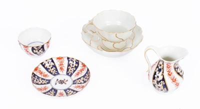 Lot 796 - A Chelsea-Derby Queen Charlotte pattern teabowl, saucer and milk jug