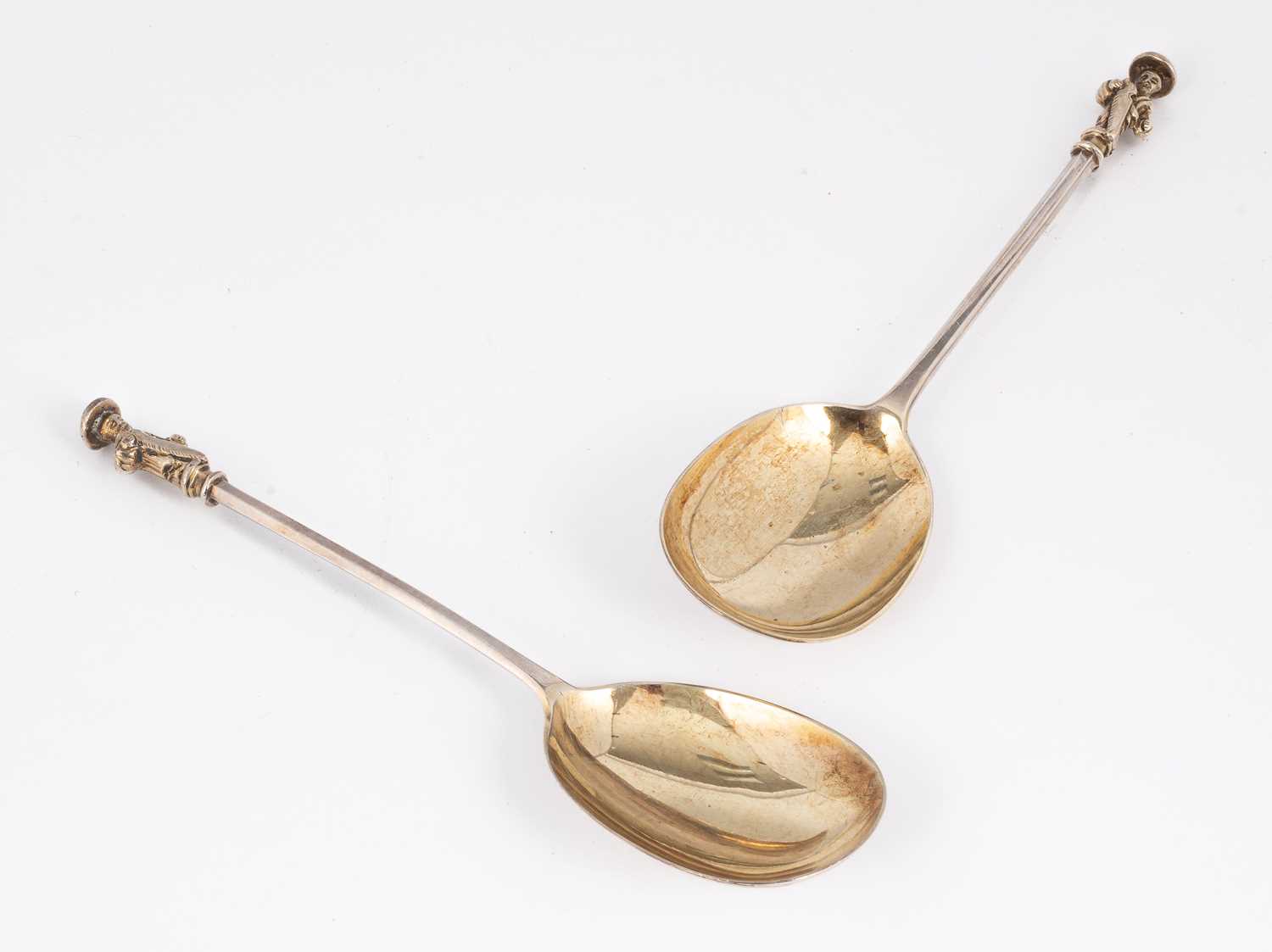 Lot 12 - A pair of Victorian silver and silver-gilt apostle spoons